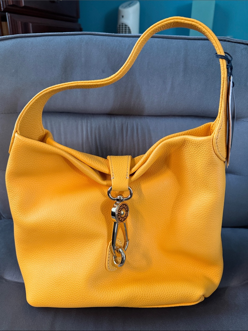 Dooney & Bourke PreLoved Very Good Dandelion Pebble Grain Small Logo Lock Sac